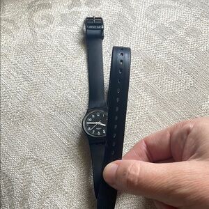 Black Analog Swatch Watch